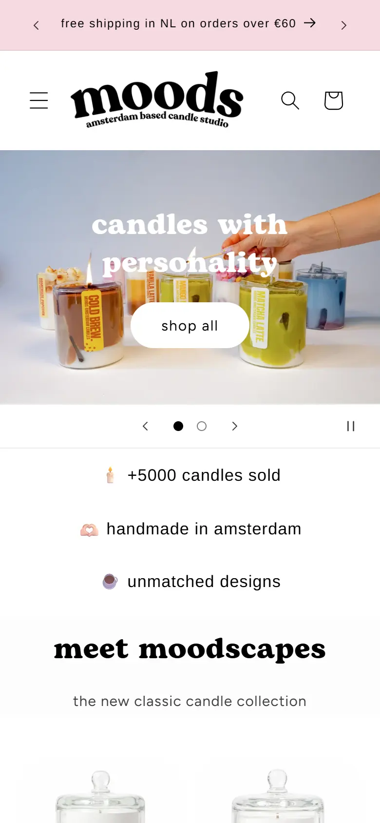 MOODS Amsterdam homepage on a phone: “candles with personality”