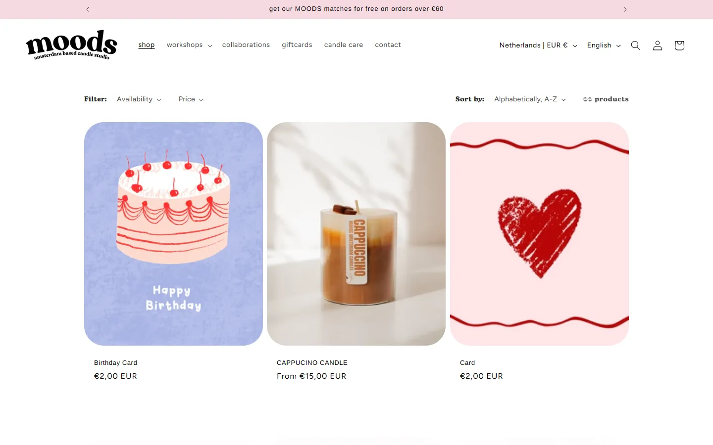 MOODS Amsterdam shop page with candles and cards